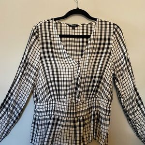 Black and white check blouse with peplum